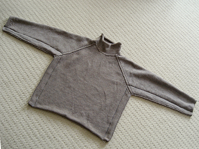 bouton Reprendre un pull à la machine