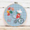 présentation toile point de croix Souris au vélo et ballons
