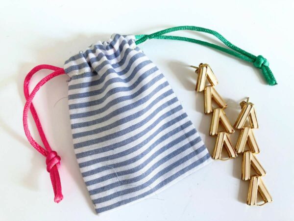pochette boucle d'oreilles