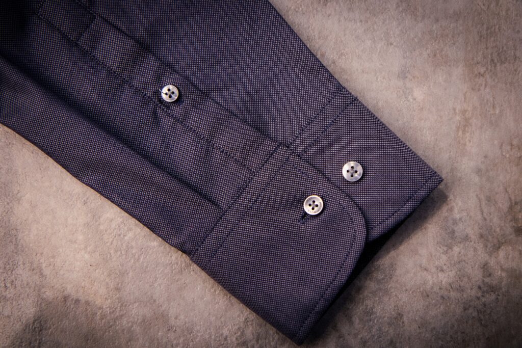 fente de manche avec patte de boutonnage