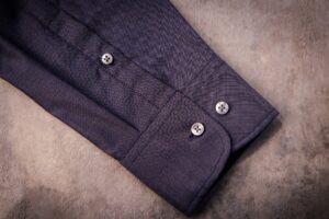 Fente de manche avec patte de boutonnage