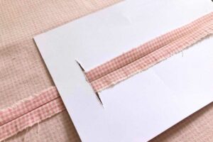 Un outil pour ouvrir et repasser les coutures